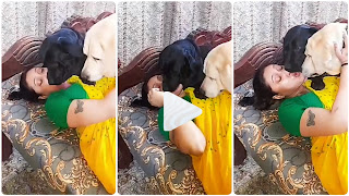 "Best Way To Show Dog Love" Lady Captured On Camera Kissing Her Two Dogs-