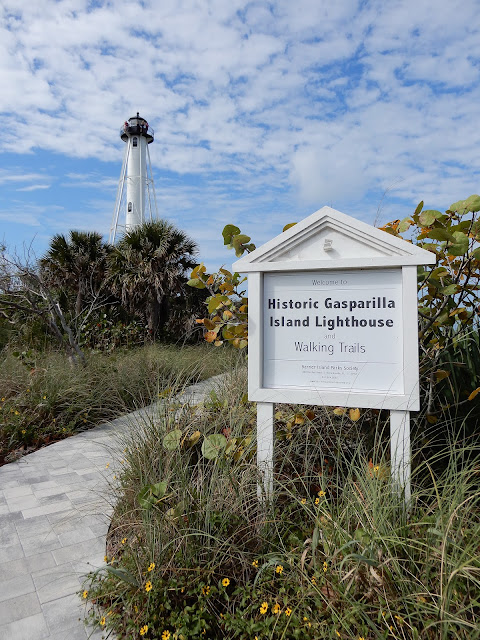 lighthouse and sign