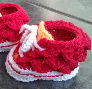 http://www.craftsy.com/pattern/crocheting/accessory/crocodile-stitch-high-top-booties/24134?SSAID=924082