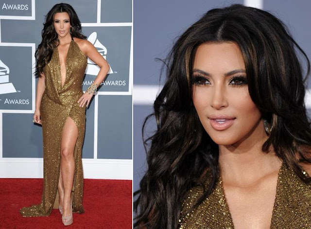 jennifer lopez 2011 grammys dress. Kim paired the gown with a