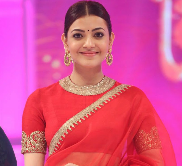 kajal agarwal latest hot navel show red saree stills