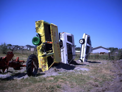 Redneck Stonehenge Fence Made from Art Cars