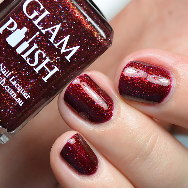 deep red nail polish with aurora shimmer