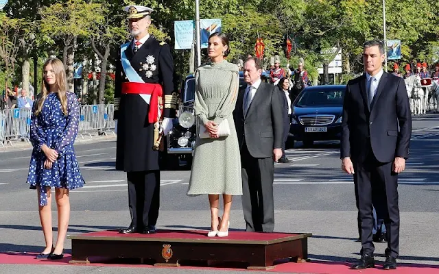 Queen Letizia in Nanda green polka-dot dress by Vogana. Infanta Sofia wore a blue polka-dot dress by Carolina Herrera