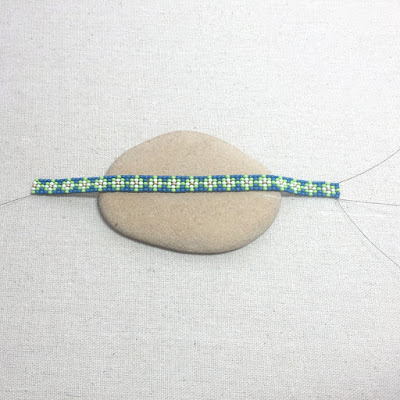 Ricks Bead Loom bracelet - threads to weave in