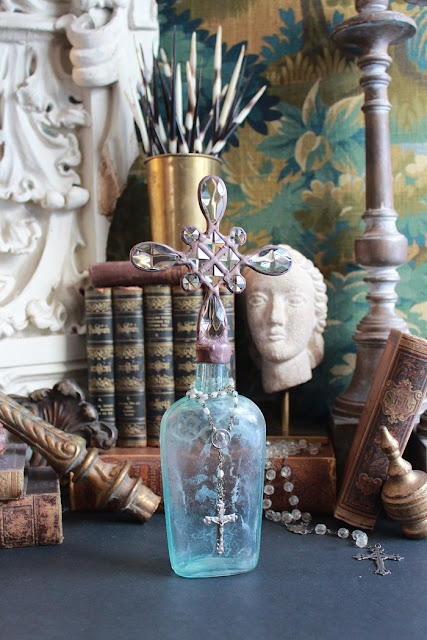 cross bottle, cross bottle guy, Cross Bottle Guy, vintage cross bottles, antique cross bottles, crosses, interior design accessories, must have accessories, luxury home decor, rosary, christian decor, rosary decor, catholic decor, Jesus, Mary, Joseph, Saints, bottles, antique bottles, vintage bottles, hand dug bottles, bottle art, altered bottles, crystals, chandelier crystals, crystal art, solder, solder art, stained glass, teardrop crystals, square crystals, octagonal crystals, crystal cross bottles, crosses on bottles, bottles with crosses on top, crosses on top of bottles, cross stoppers, crystal cross bottle stoppers, aqua bottles, blue bottles, amber bottles, clear bottles, hazy bottles, white bottles, medicine bottles, pharmacy bottles, antique glass bottles, antique glass flask, decor, decorations, designer accessories for the home, interior design accessories, cross bottles, crossbottles, crossbottleguy, vintage cross bottle art, cross bottle art, bottle art, handmade art, unique art, one of a kind art, handmade, unique, art, one of a kind, authentic art, vignette styling