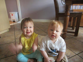 babies on kitchen floor