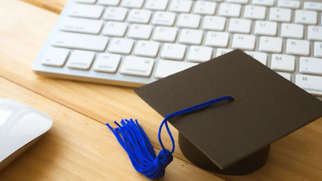 grad-hat-and-keyboard