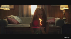 Megan Fox plays with fire.