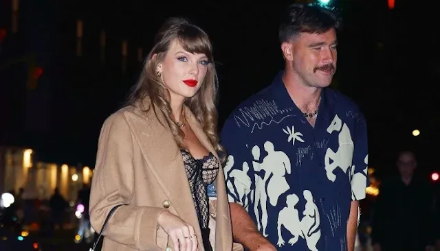 Taylor Swift and Travis Kelce walking together, highlighting astrology rumors