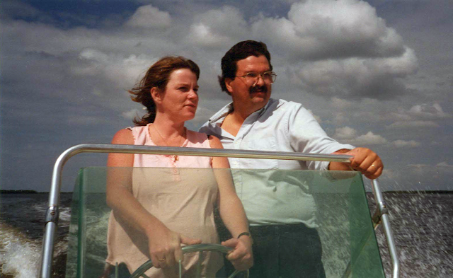 Husband and wife boating in Florida.