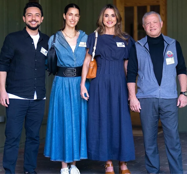Princess Rajwa wore a blue classic hooded denim bodysuit by Alaia. Queen Rania wore a blue dress by Vocavaca