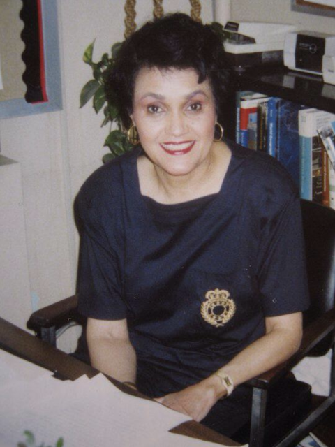 color photo of Betty M Wheeler in her office at Metro High School 5017 Washington St Louis Missouri