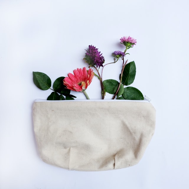 A white small tote handbag.