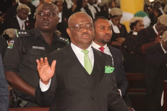 Governor Wike Pictured Praying In Church During Service For New Legal Year