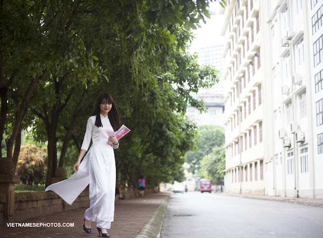 The beauty of Vietnamese student girl wear ao dai 10