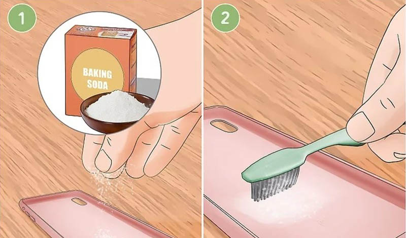 Rắc baking soda lên ốp và vệ sinh bằng bàn chải