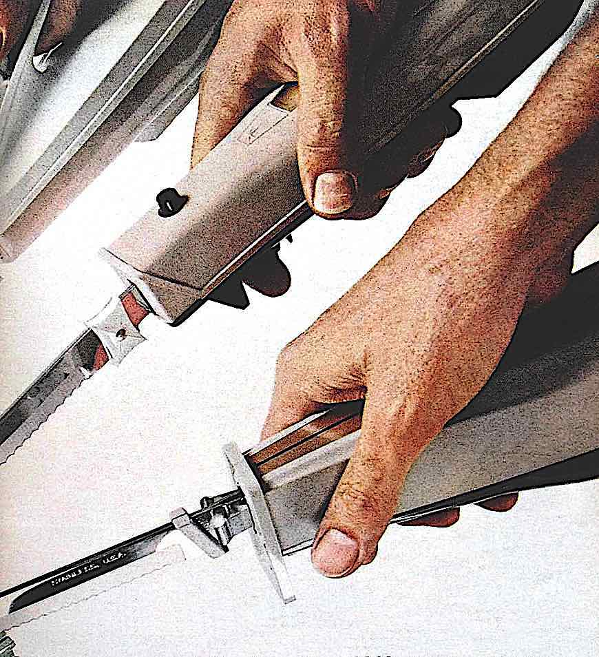 1966 electric knifes, a color photograph