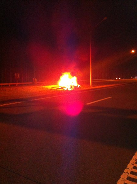 Bentley Continental GT burns at side of road after high speed accident