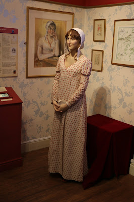 Portrait and waxwork of Jane Austen  on display at the Jane Austen Centre in Bath