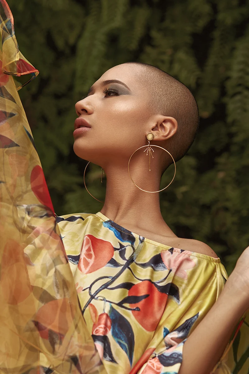 portrait of a young woman with statement accessories