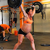 Pregnant woman enjoys working out during her pregnancy 