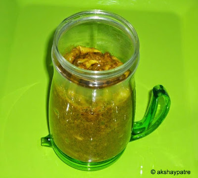 Green chilli pickle in a jar