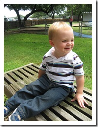 Reid waved & smiled to the big boys walking around the school.