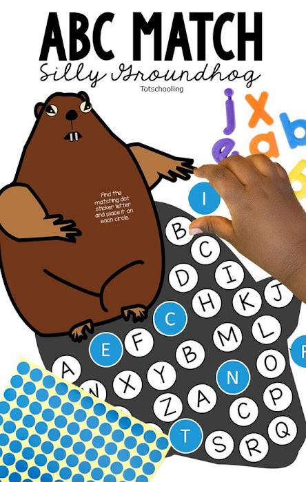 FREE printable Groundhog Day Alphabet learning game with stickers for preschool kids to practice letter recognition on the groundhog's shadow!