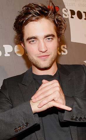 robert pattinson ugly pics. ladies at Robert Pattinson