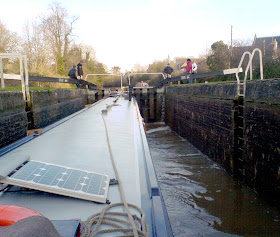 Kennet and Avon canal, The view from the helm of a narrowboat in a lock at Devizes, Wiltshire.