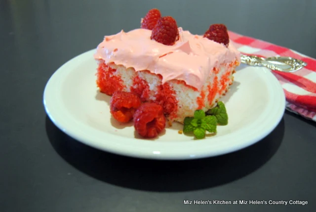 Raspberry Poke Cake With Marshmallow Frosting