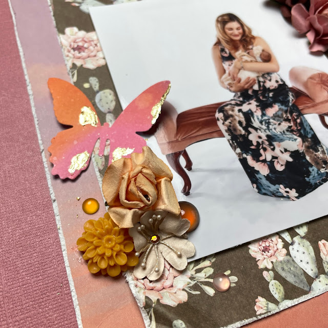 Newborn photography scrapbook layout made with: Prima Marketing Golden Desert patterned papers; Kaisercraft paper blooms flowers; T Holtz Distress Oxide Inks, Mini Detailed Butterfly die cuts