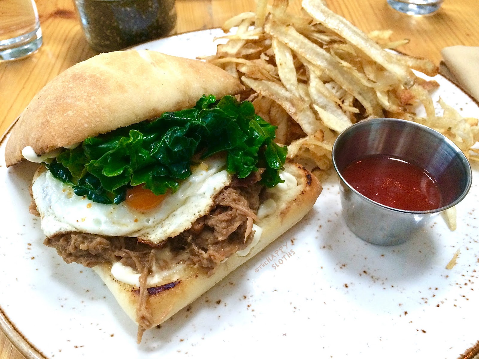 Nomad Vancouver Slow Cooked Pork and Egg on Ciabatta 