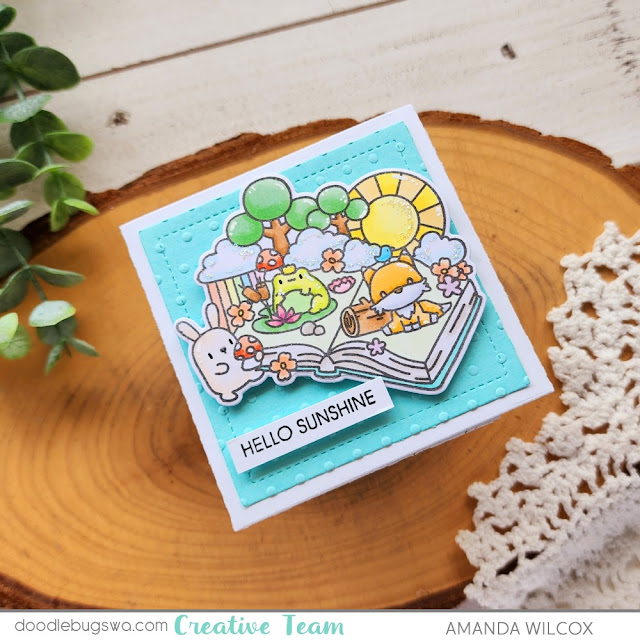 Create a mini note card using the Sweet Note die from Pretty Pink Posh and embellish with the Mama Elephant Storytime stamp and die