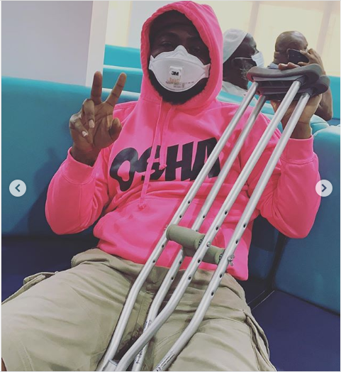 Davido fractures his leg, now using crutches