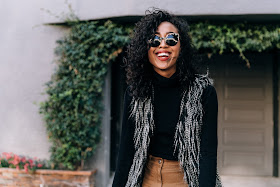 pancake stacker wearing a fuzzy faux fur vest, everlane wide leg crop pants, everlane day heels, and a gap turtlneck sweater