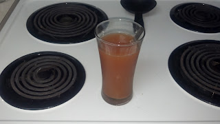 orange drink, cup and spoon, xpand 2x orange, xpand 2x, xpand, dymatize, water