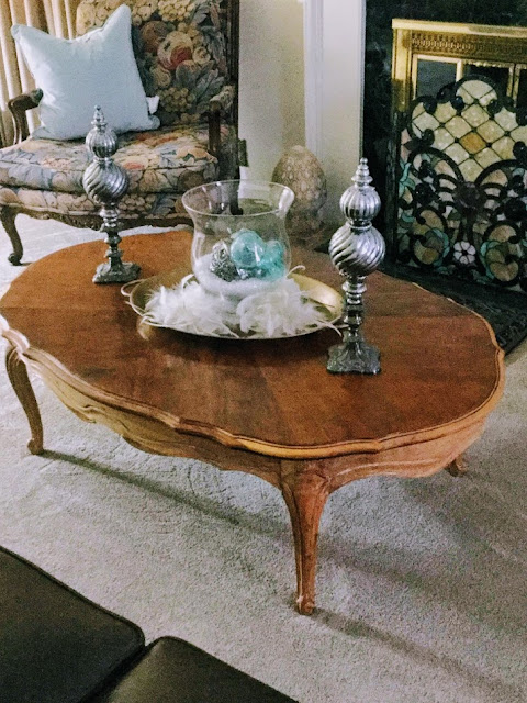 French provincial coffee table styled in living room