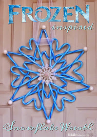 http://sweetsugarblossoms.blogspot.com/2014/12/frozen-inspired-snowflake-wreath.html