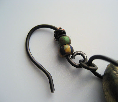 Handcrafted ear wire in darkened steel with Czech beads