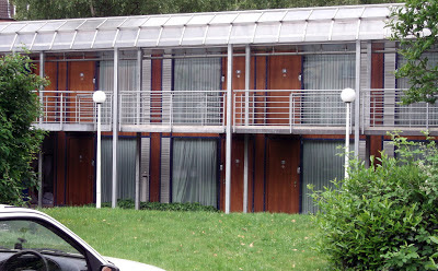 Image of the Hotel Böll accomodation block with grassed area in the foreground