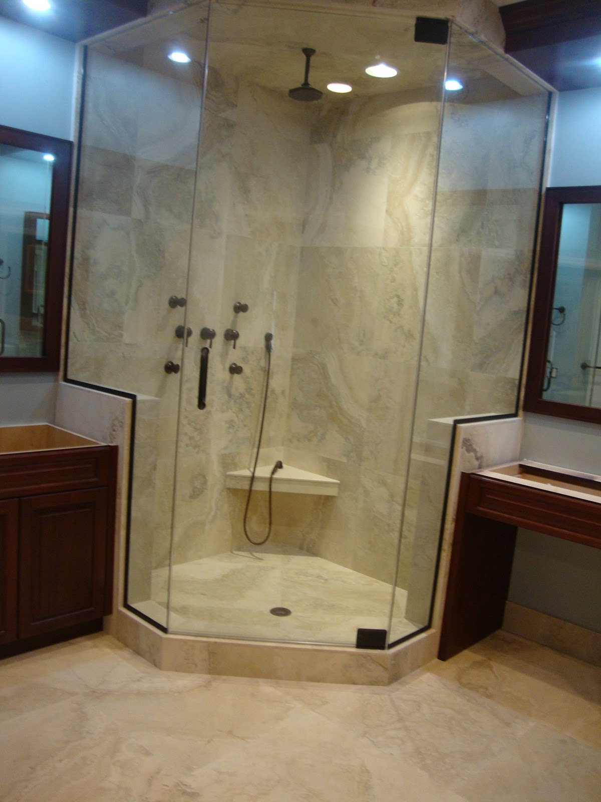 bathroom counter ideas Master Bathroom Shower in Italian Travertine by KG Marble Designs Inc.