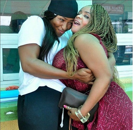 Omg! See What a Woman Did to Cossy Ojiakor's Gigantic Boobs in Public (Photos)