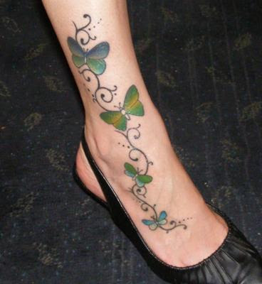 Butterfly and Vine Tattoo Posted by Zanisa Labels Butterfly Tattoo