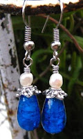 wire wrapped dangle earrings with blue teardrop beads and pearl