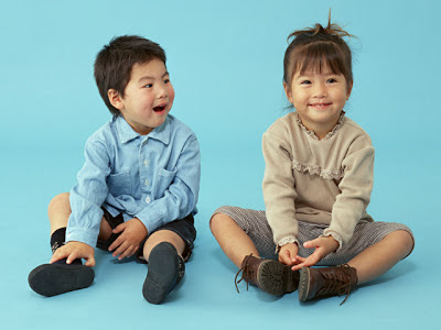 NAMC young montessori class behavioral challenges circle time young boy and girl sitting