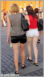 Girls in black and white shorts on the street