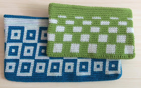 Blue purse and green purse with slanted patterns