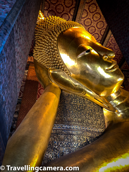 Reclining Buddha in Wat Pho of Bangkok has a brick core.      Thousands of people visit this temple to see this huge Reclining Buddha and at any point of time there are hundreds of people in the hall. Volunteers inside Wat Pho suggest to keep moving. So you get very few moments inside the temple. The day we visited Wat Pho, it had a huge queue at every temple inside the campus.      Related Blogpost from Thailand - Snorkeling near Phi Phi Islands, Walk along Kata and Kata Noi Beaches || 10-Day Vacation in Thailand (Day 6)